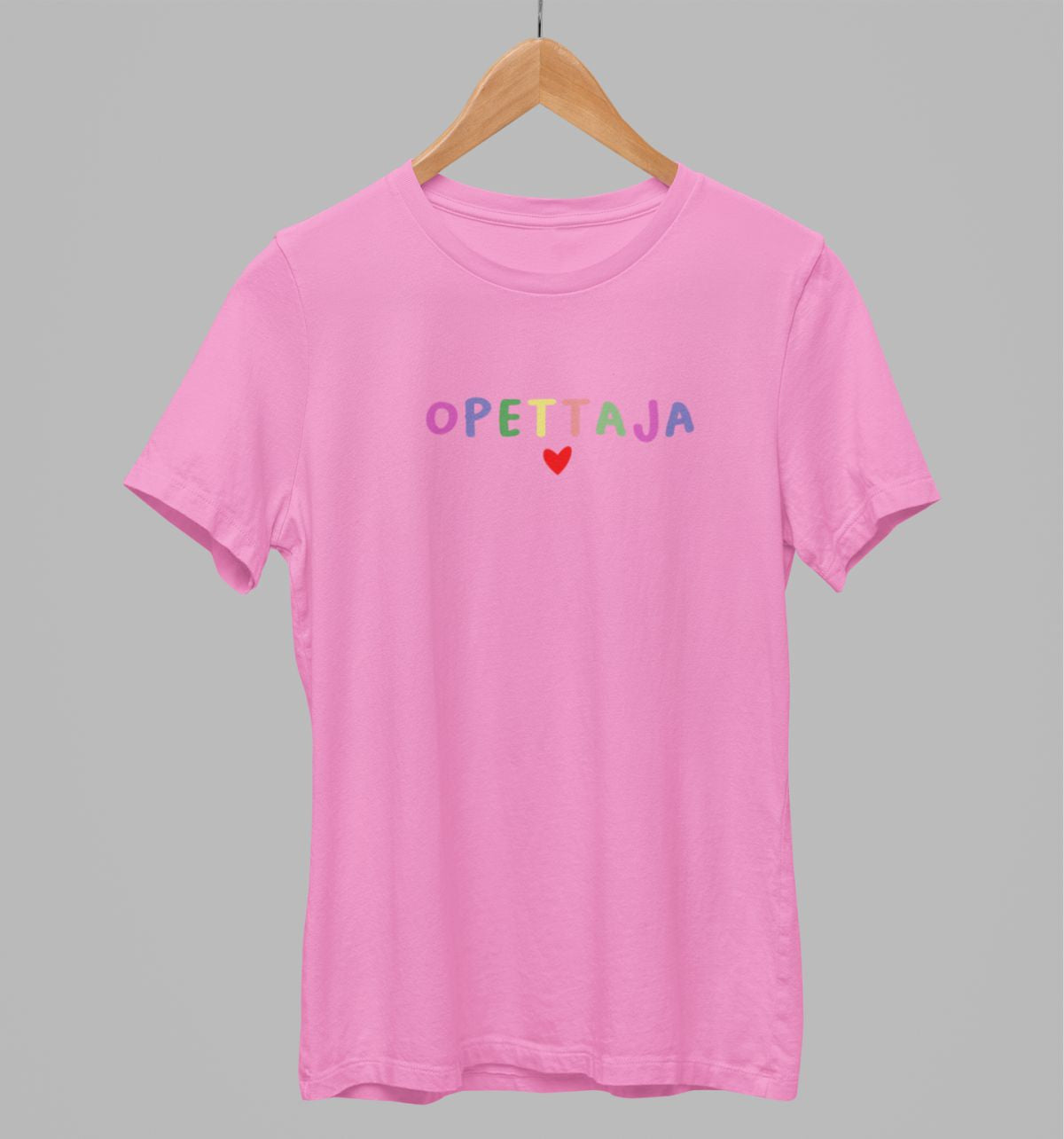 Vaaleanpunainen unisex T-paita "Opettaja"