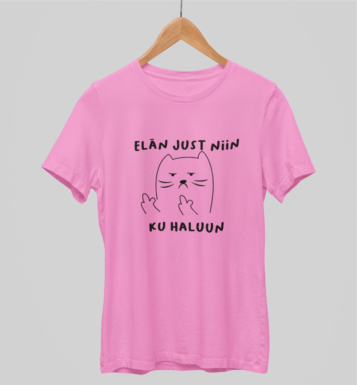 Vaaleanpunainen unisex T-paita "Elän just niin ku haluun"